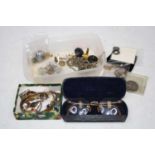 A collection of miscellaneous items to include 1972 Liberty half dollar, wrist watch part movements,