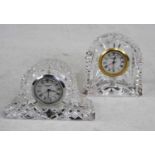 A Waterford cut crystal dome top mantel clock having a circular enamel dial with quartz movement,