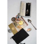 A collection of miscellaneous items, to include Ethiopian coin, Eastern Counties Motor Club