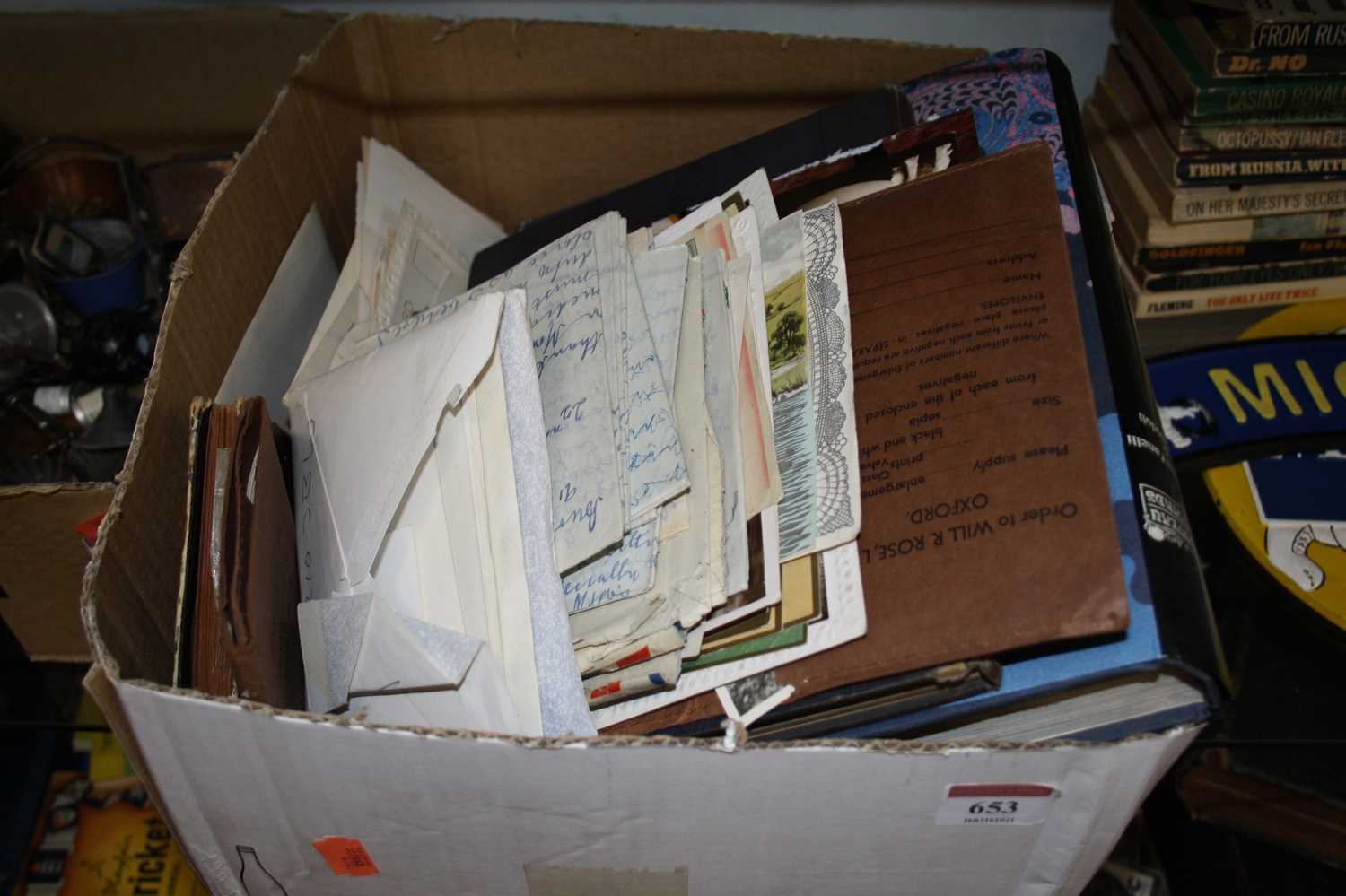 A box of miscellaneous items, to include various photographs, Art Nouveau postcard book, postcards