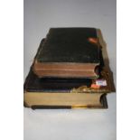 A Victorian brass mounted and leather bound family Bible; together with one other example (2)