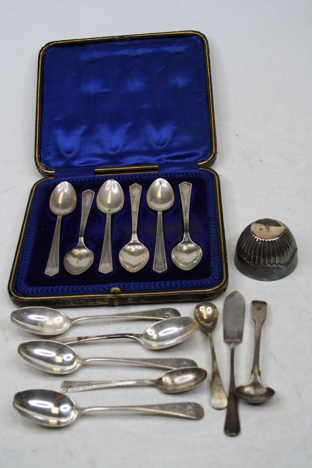 A set of six mid-20th century silver teaspoons, in fitted leather case; together with various