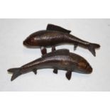 A pair of modern bronzed metal figures of koi carp, length 26cm