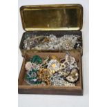 Two boxes of miscellaneous of costume jewellery to include paste set brooches, clip earrings, ladies