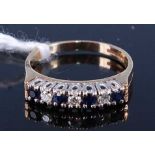 A 9ct gold, sapphire and diamond half hoop ring, having seven alternating round cut stones, 2.4g,