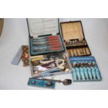 A collection of miscellaneous items to include cased silver plated teaspoons, various souvenir
