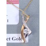 A contemporary 9ct two-colour gold diamond set pendant, the round brilliant weighing approx 0.1