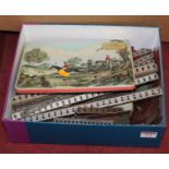 A box containing a collection of Meccano