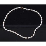 A 9ct gold and cultured pearl single string necklace, 7.1g, 38cm