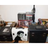 A collection of Elvis Presley related memorabilia, to include DVDs, LPs, magazines, cassettes and
