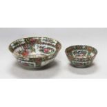 A Chinese Canton bowl decorated in the Famille Rose palette with further panels of figures and