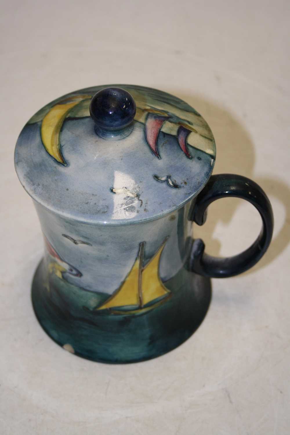 A Moorcroft Pottery lidded mug of waisted cylindrical form, tubeline decorated in the Bermuda - Image 4 of 6