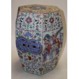 A 19th century Chinese Canton Famille Rose garden seat of hexagonal form, enamel decorated with