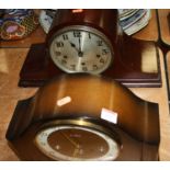 A 1960s oak cased mantel clock, the eight day movement with chimes, the chapter ring showing