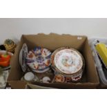 A box containing a collection of various ceramics, to include a Japanese Kutani teapot, Arita plate,