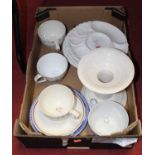 A box containing a collection of various ceramics, to include asparagus dishes, a large candlestick,