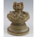 A Chinese pottery vase, the body modelled as two kylin to the shoulder with the heads and the