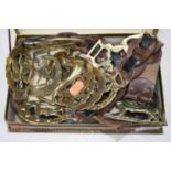 A box of assorted horse-brasses