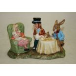 A Beswick ware figure group, The Mad Hatter's Tea Party, LC1, limited edition No. 1394/1998,