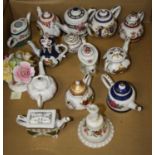 A collection of 20th century miniature porcelain teapots