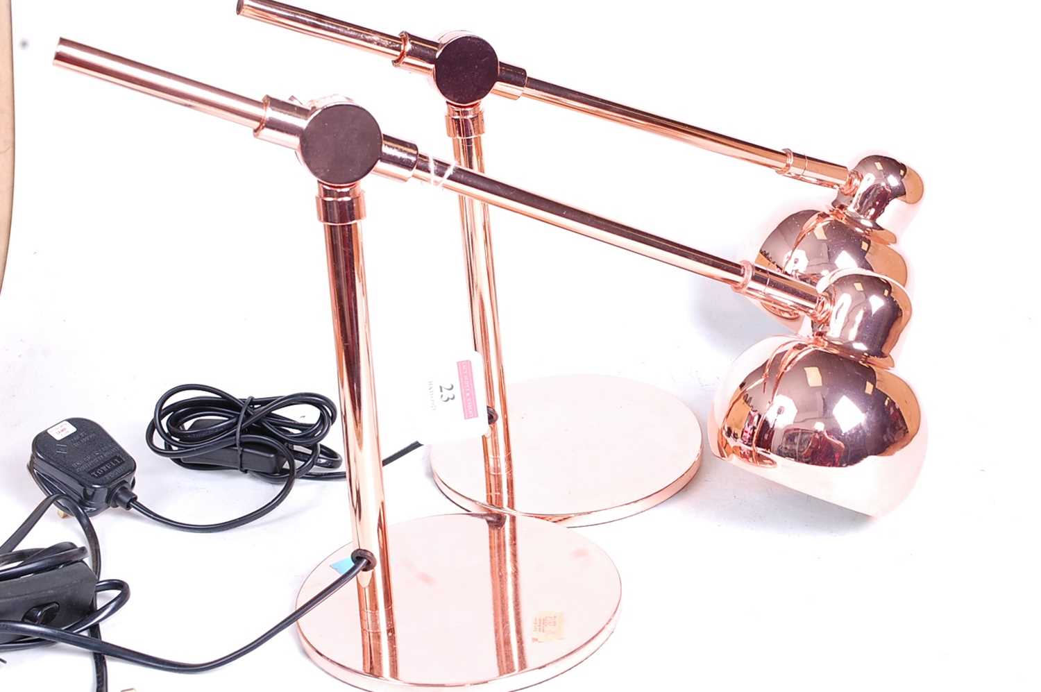 A pair of modern rose-gold coloured metal anglepoise desk lamps, each h.25cm - Image 2 of 3