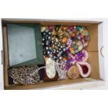 A collection of miscellaneous items, to include silver plated nurse's buckle, beaded necklaces,