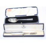 A mid-20th century silver christening spoon, in fitted leather case; together with a cased knife and
