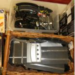 A large and a wicker basket containing various used Scalextric items, to include track, cars etc