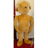 An extremely large plush freestanding teddy-bear by Merrythought, with jointed shoulders, h.6ft