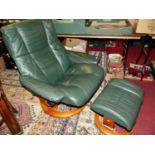 A contemporary Stressless green leather and formed leather laminate framed swivel armchair, with