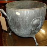 An anodised brass twin handled cauldron shaped coal bucket