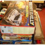 A Scalextric boxed Escort Rally set (appears largely complete); together with further Scalextric