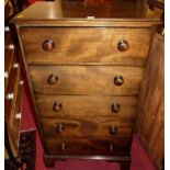 A mahogany narrow chest of five long drawers with turned knob handles, width 68.5cm