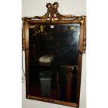 A contemporary French style bevelled rectangular wall mirror, the reeded frame surmounted with