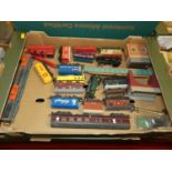 Two boxes of Hornby 00 gauge wagons, together with some track and controllers etc