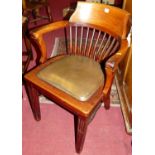 An early 20th century walnut tub slatback captain's chair, having a leather fixed pad seat, w.58cm