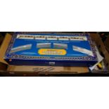 A large box containing a group of 'Walt Disney World' monorail sets and track, further monorail etc