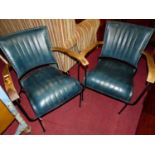 A pair of contemporary French style painted rod-metal framed and leather slung open armchairs,