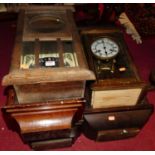 Five various circa 1930s and later droptrunk wall clocks