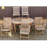 A contemporary slatted teak garden suite comprising; D-end extending table with pull-out action