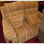 A contemporary Parker Knoll striped upholstered two-seater sofa, raised on turned forelegs, w.150cm