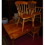 A modern pine round cornered farmhouse kitchen table, on turned supports, length 152cm; together