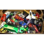 One box of various playworn diecast model vehicles, to include a large green plastic tipper