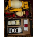 Two boxes of large scale cars and trucks, to include Ford puck-up US Police car, Tonka cement