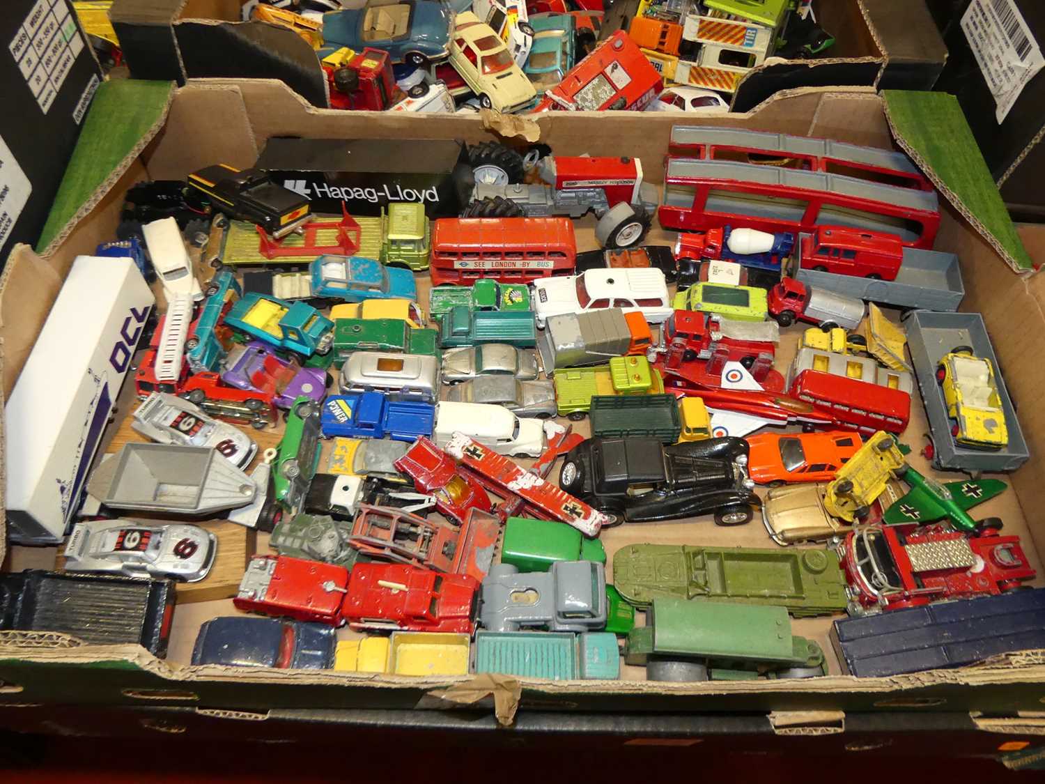 Two boxes of various playworn mainly Matchbox and Dinky loose diecast model vehicles