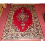 A Persian Kashan red ground rug, 210 x 140cm