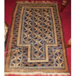 A Turkish woollen blue and cream ground prayer rug, 140 x 95cm