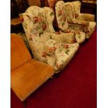 A 19th century French walnut framed and floral upholstered open armchair in the Louis XV style,