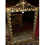 A reproduction brass framed wall mirror, 97 x 59cm