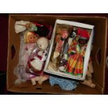 A box of various dolls, to include war-time souvenir dolls